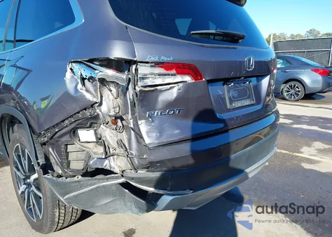 2022 Honda Pilot 2Wd Touring 7 Passenger z USA, uszkodzony, nr VIN 5FNYF5H67NB011450